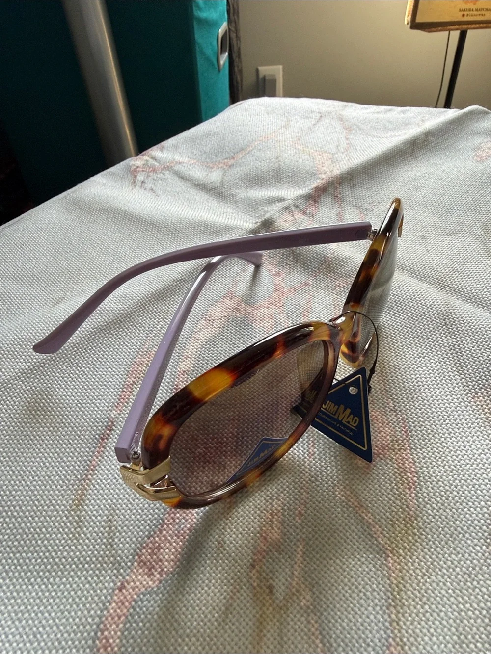 Tortoiseshell Oval Sunglasses with Lavender Temples